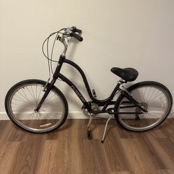 Cruiser  Bike with 7 speeds/ Purple / Tawnie /Almost new