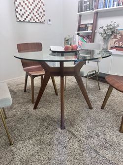 West Elm round glass dining table