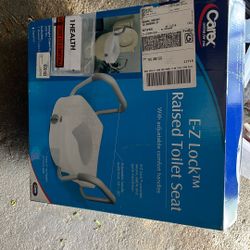 Toilet  Seat Raised New