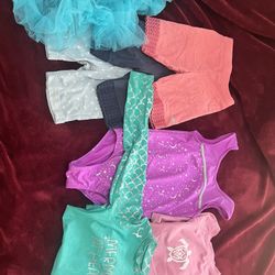 Gymnastics Bundle With 2 Rashguards And A Tutu Skirt For Girls Ages 6-7. Take All For Price Listed. No Lower. Firm On Price 