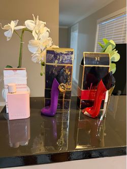 Carolina herrera y Burberry Her