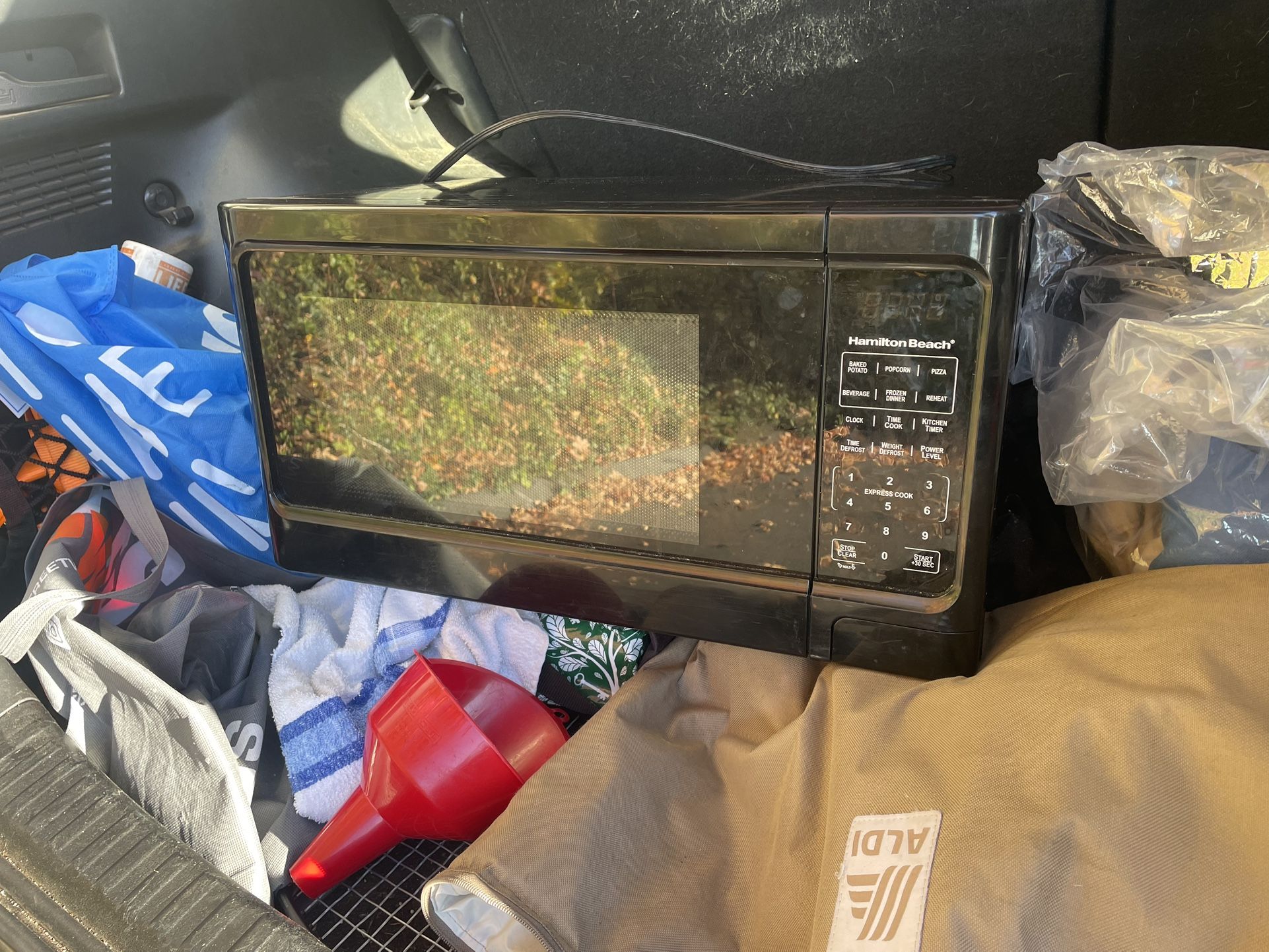 Large Black Microwave, Works Great A Few Scratches. Not A Great Picture..