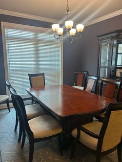 Dining Table with leaf, 8 chairs, and hutch