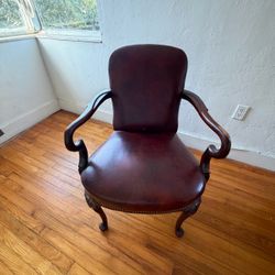 Antique Leather Armchair with Carved Wood Frame