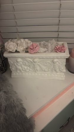 White porcelain baby cherubs