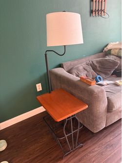 Vintage side table with attached lamp