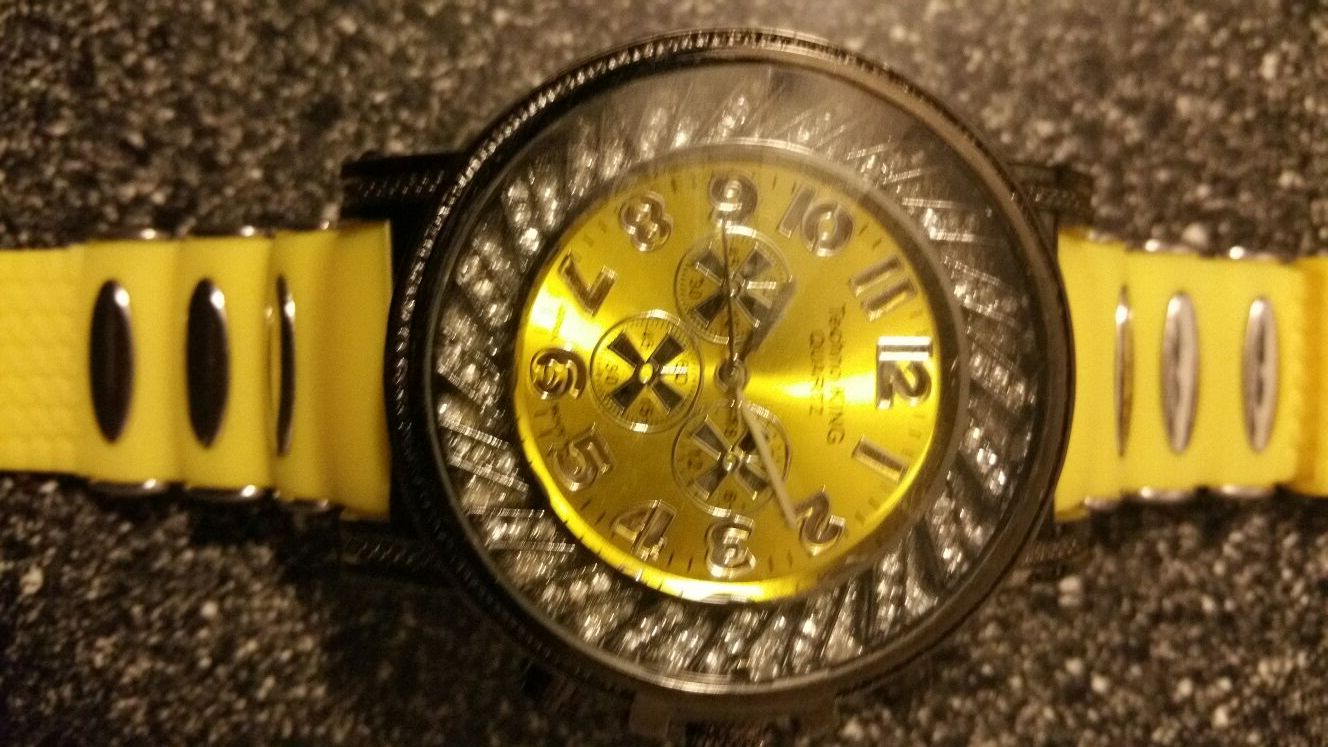 Yellow techno King quartz watch.