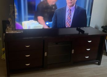 Tv stand great condition and sturdy $50