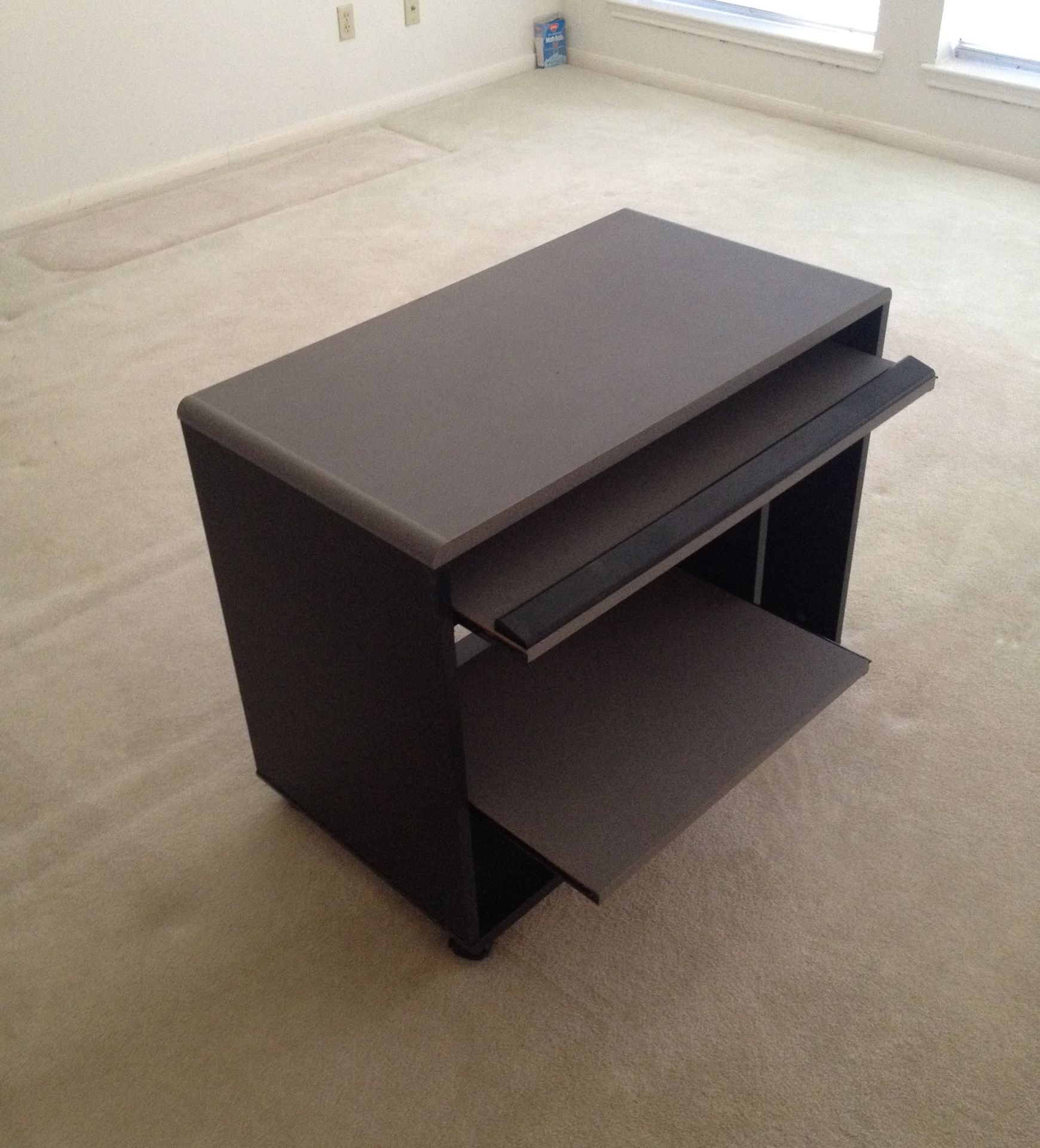 Compact computer desk.