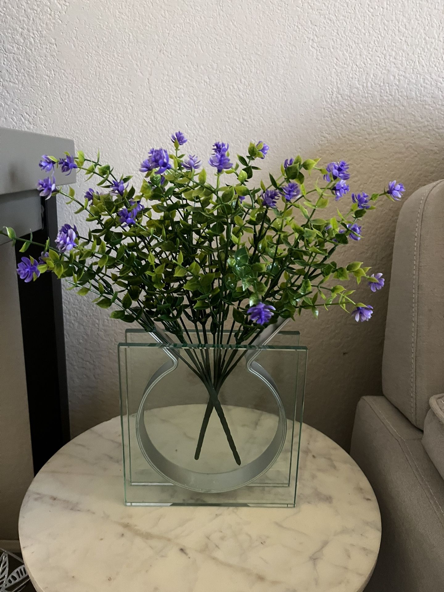 modern glass vase with flowers / home decor