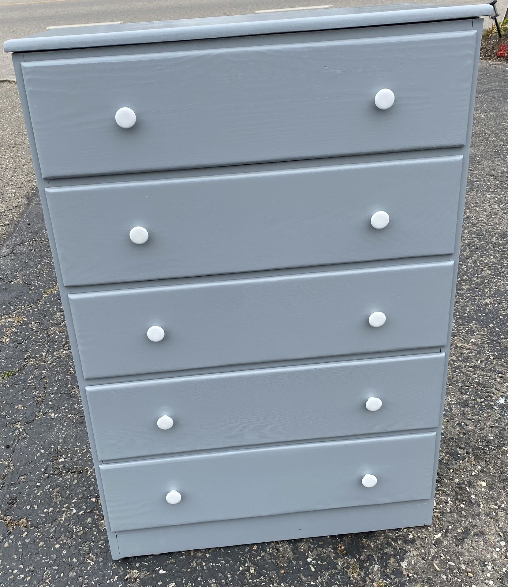 Dresser light gray vertical  Five drawers I’ll slide very nicely. They all have white ceramic knobs.  #7140 Dressers made out of solid pine for the mo