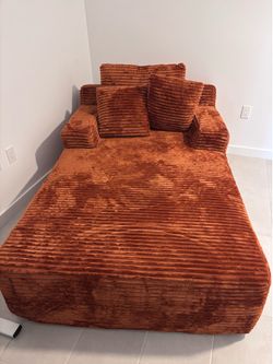 Burnt orange oversized lounge chair
