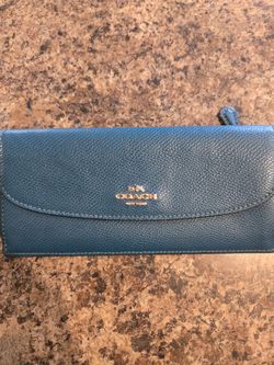 Blue Coach wallet with zipper