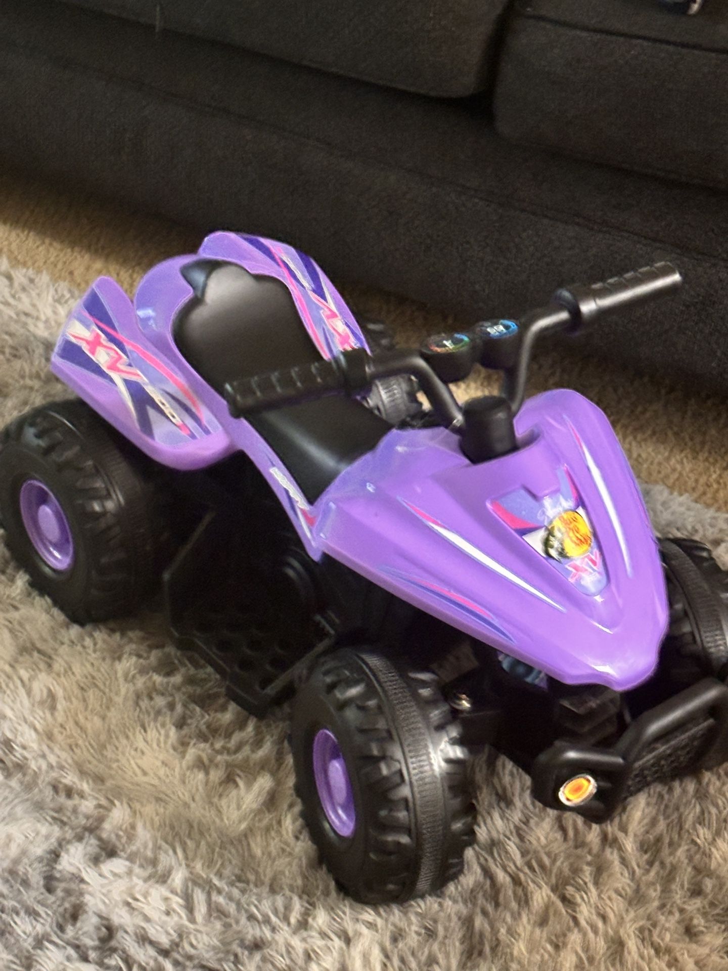 Kids four-wheel-drive motorcycle