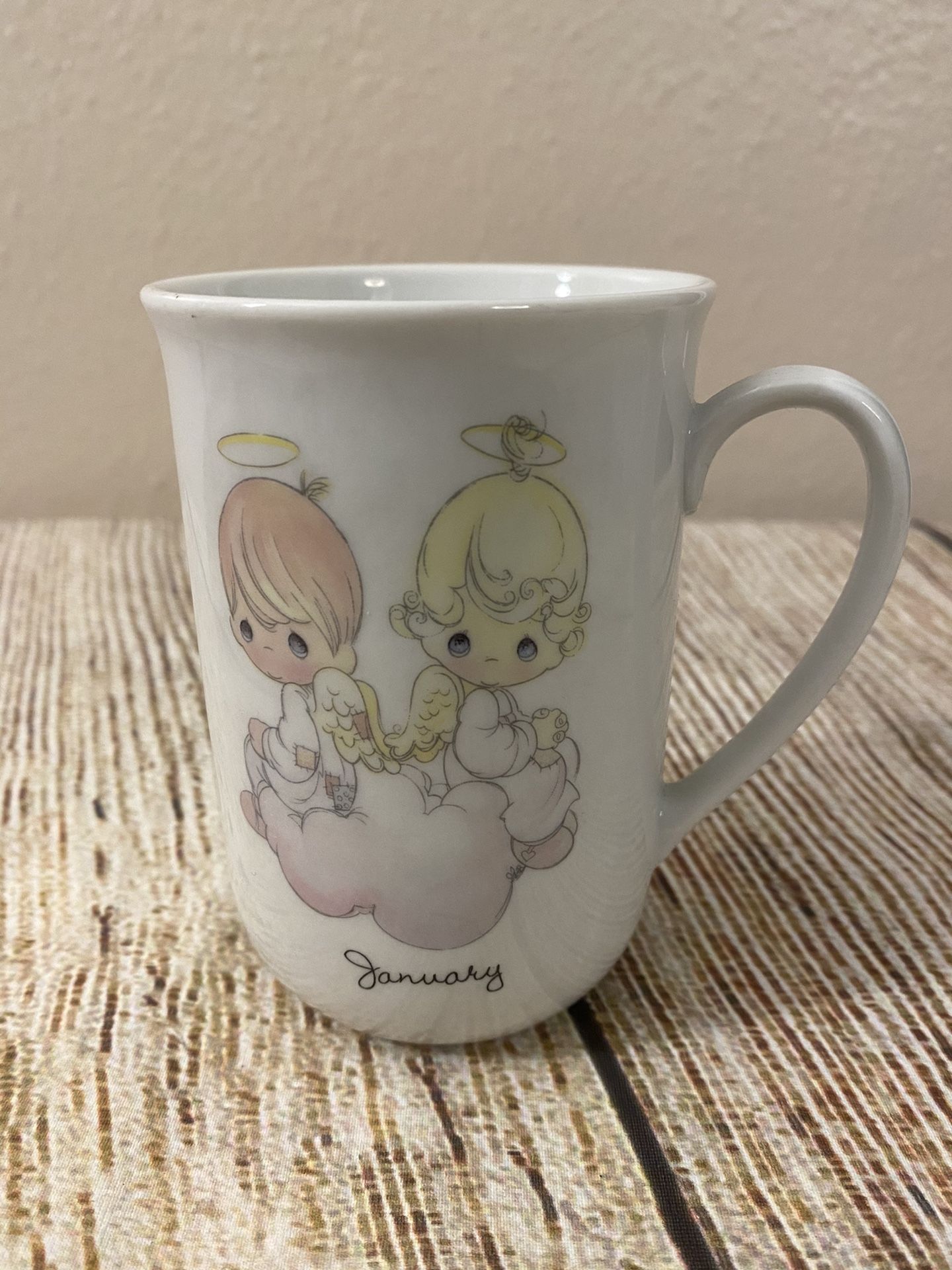 Precious Moments Cup "January" 