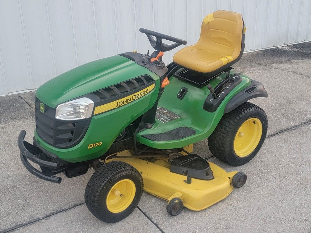 John Deere D170 riding lawn mower.  26hp engine,  54" deck and auto transmission.  Many new parts. delivery available.  Runs.
