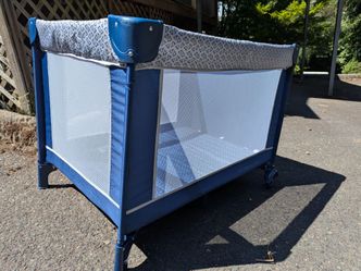 Portable playpen with carrying bag