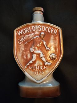Rare vintage item. Two different pics on ea side.EMPTY.