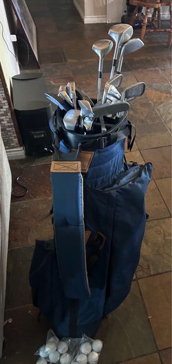 Golf clubs 18 of them, 15 golf balls, several golf tees & golf bag