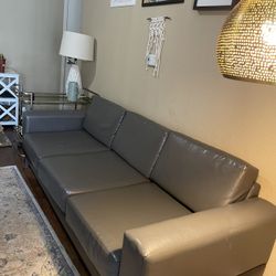 Gray, faux Leather Couch