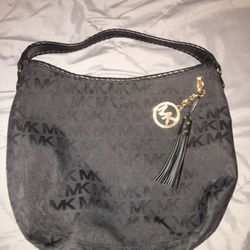 Black Michael Kors big roomy purse like new, wore once. No rips, stains very clean. $50- firm! No less!Pick up only South h & White
