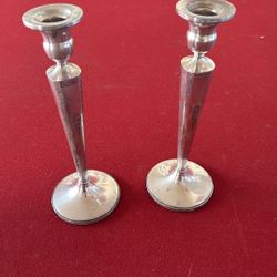 Sterling silver candlesticks with etched floral design