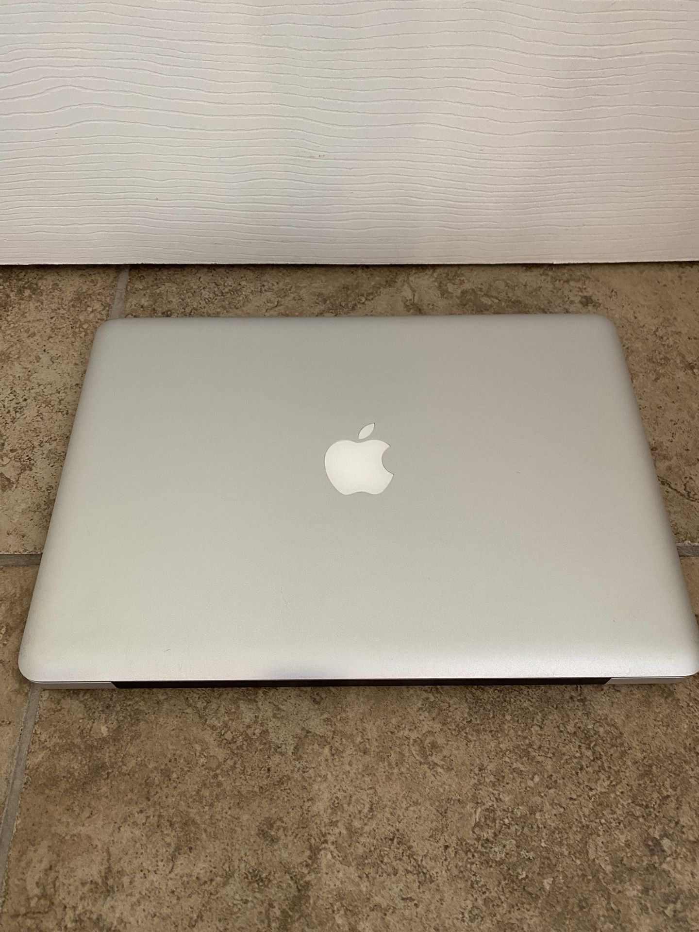 Mid 2012 MacBook Pro with 256 GB SSD, 16 GB Ram, and 1.5 GB Video