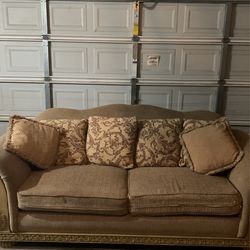 A pair of Brown Couches
