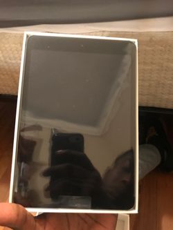 iPad mini 2 brand new never turned on still in plastic
