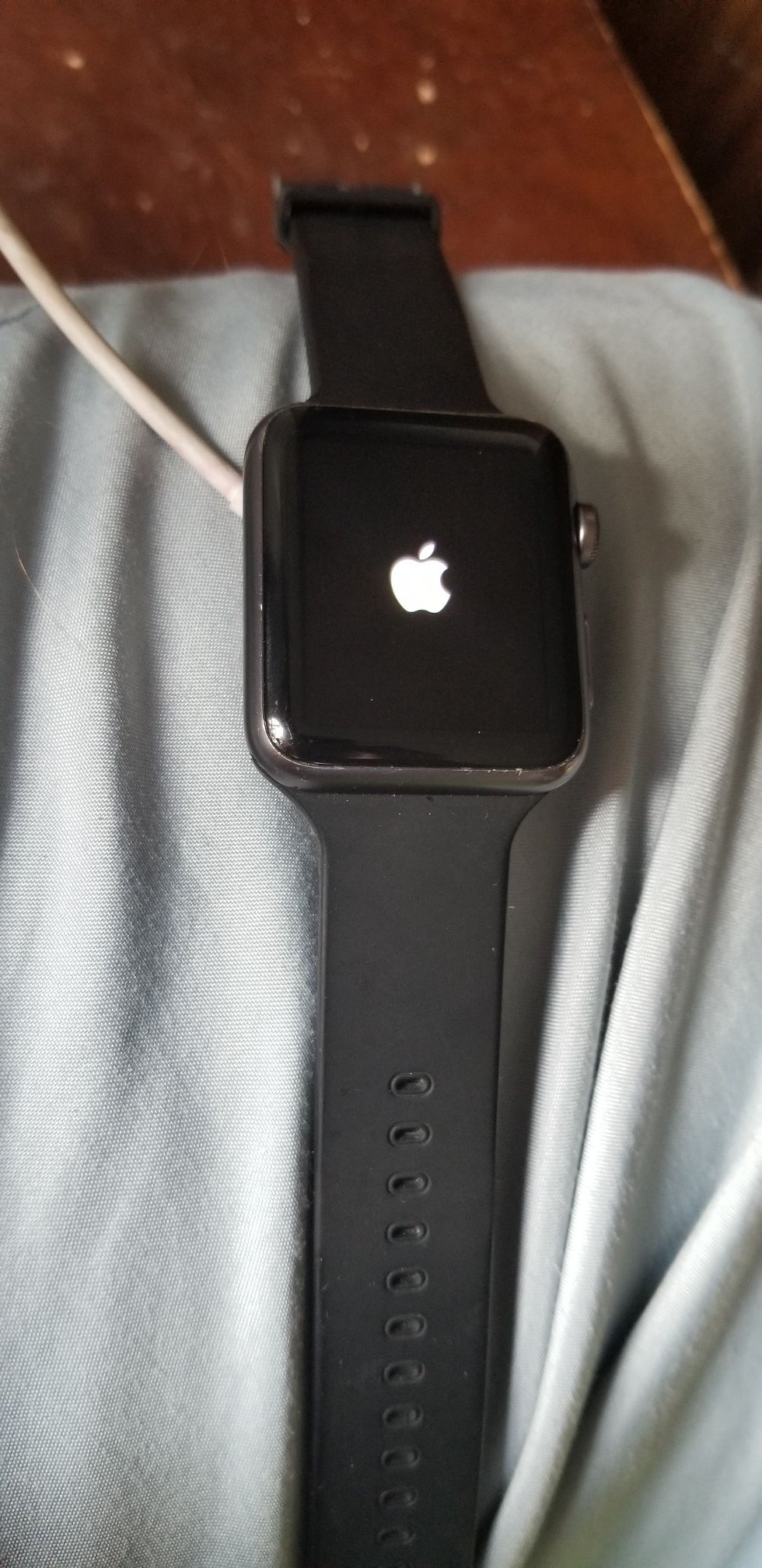 Apple watch Series one 42 mm **does not come with charger**