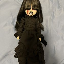 The Dark Living Dead Doll
