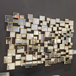 Unique Eccentric 50 Individual Mirrors Connected With Gold Trim.