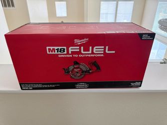 Milwaukee M18 FUEL 7-1/4" rear handle circular saw, model 2930-20. Tool only, battery not included. Compatible with all M18 batteries. New in box. Nue