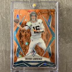 2025 Panini Phoenix Trevor Lawrence Orange Winter Snowflake #/99 SP Jags