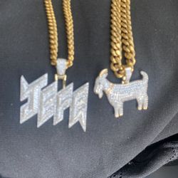Two Gold Chains With Pendant 
