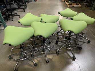 Human Scale Saddle Stools, wipeable green vinyl, brand new, 7 each
