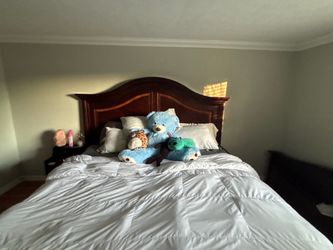 Solid wood king bed frame headboard and footboard. $100