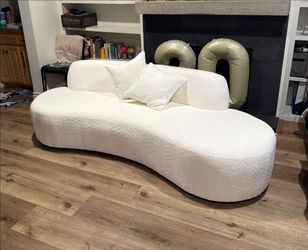 Modern White Curved Sofa with textured fabric