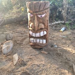 Tiki And Carved Snake