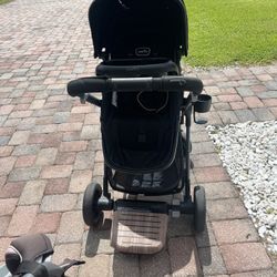 Evenflow Double stroller W/ 2 Bassinets, Stroller Rider And Attachments 