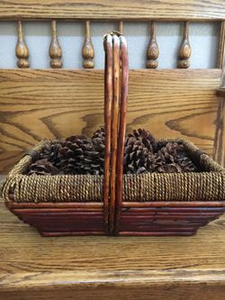 cute rectangular basket with pinecones