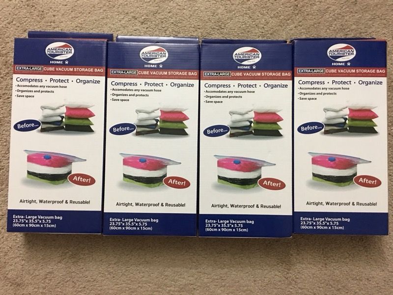 4 american tourister extra large vacuum storage bags. brand new. box unopened.