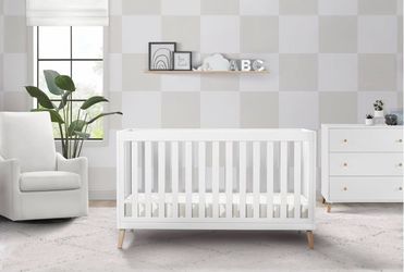 Delta Essex crib in white with natural wood colored legs- NEW IN BOX