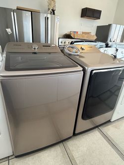 SAMSUNG topload washer and electric dryer