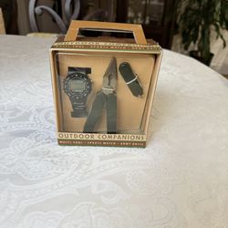 "Outdoor Companions" set, which includes a multi-tool, a sports watch, and an army knife. New. Still in original packaging. Collectible. Designed for 
