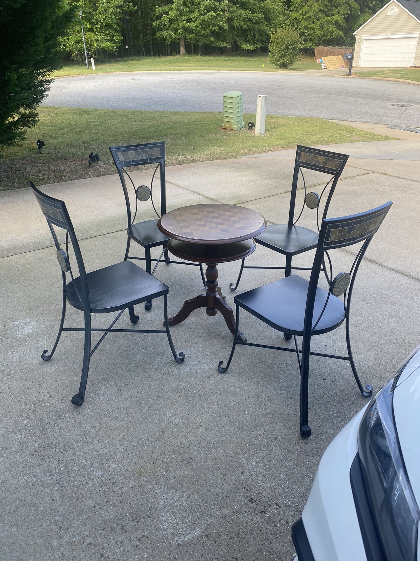 SET of 4 sturdy iron DINING ROOM CHAIRS .