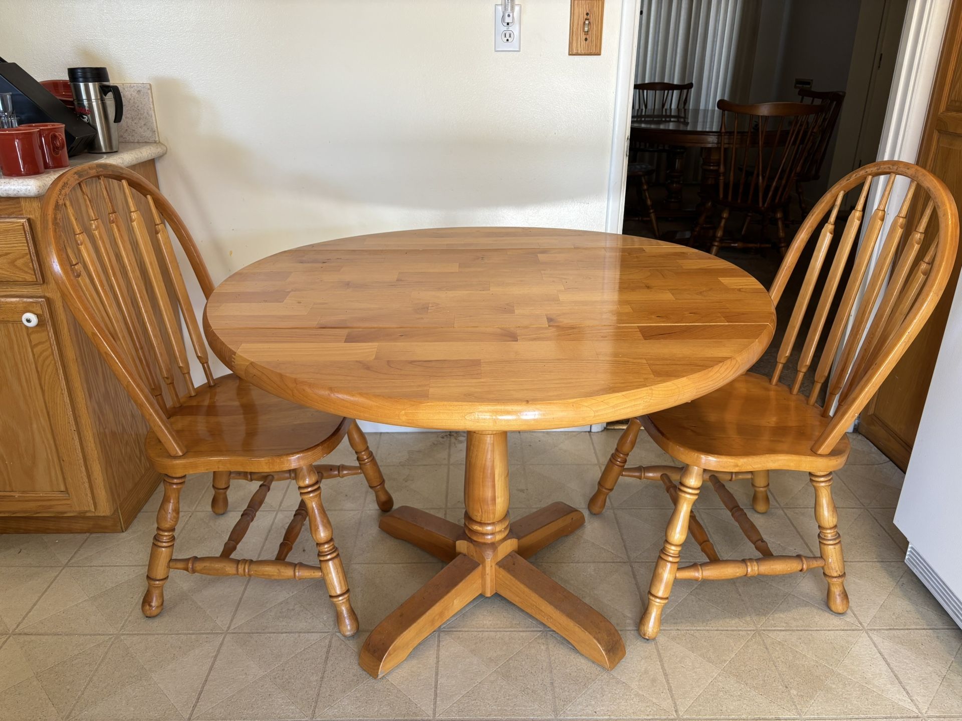 Dining table and two chairs