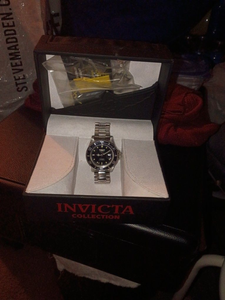 The Watch Is Called Invicta It's In Good Condition Got The Back With It And Everything But No Battery It Works And Everything