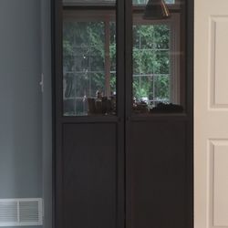 Dark brown glass cabinet
