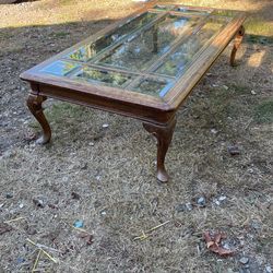 Solid wood table with beveled glass